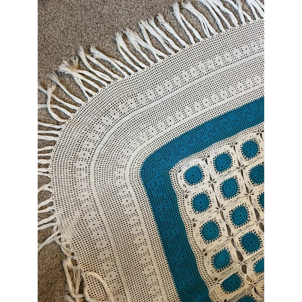 Turquoise and creme afghan with 5 inch fringe